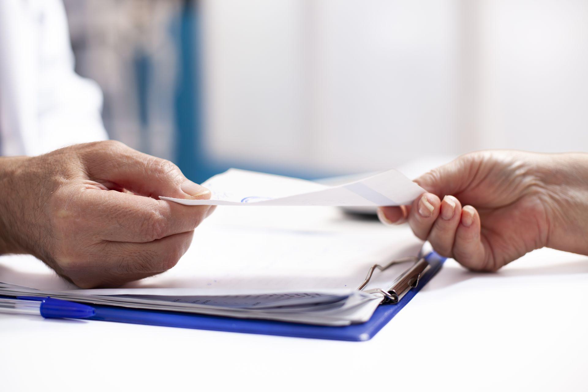 patient receiving medical document